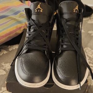 Jordan Black and Gold Sneakers